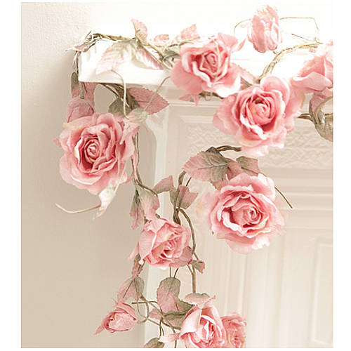 Artificial flowers above fireplace