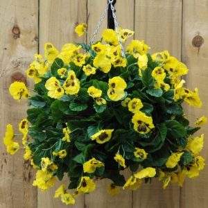 Yellow artificial pansy hanging basket