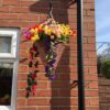 Cone shaped artificial hanging basket with mixed colourful flowers - Image 4
