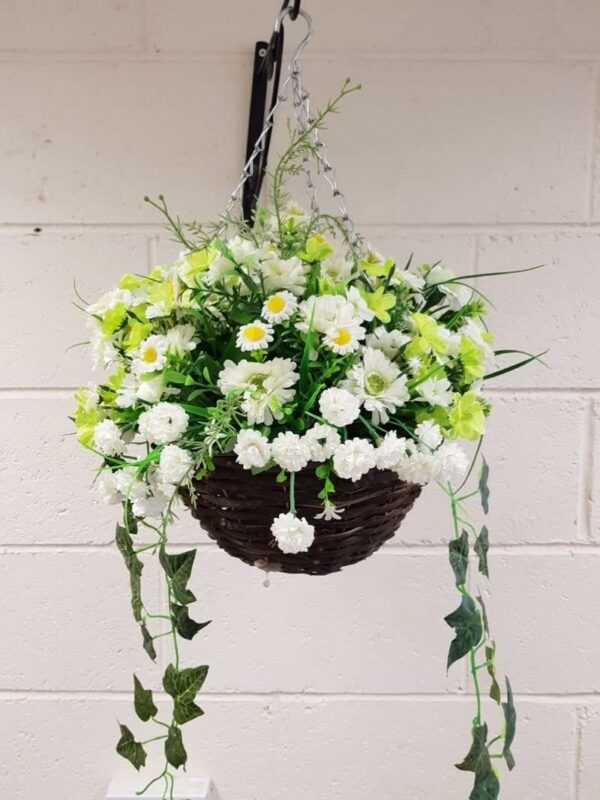 White artificial flowers hanging basket