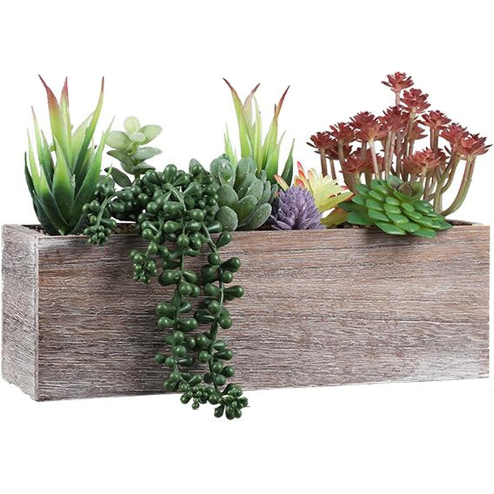 Varied artificial succulents and trailing greenery in a rustic wooden rectangular trough