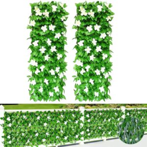 Pair of expandable green ivy trellis panels with white orchid-style flowers