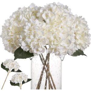 Full white artificial hydrangea heads with green leaves and brown stems