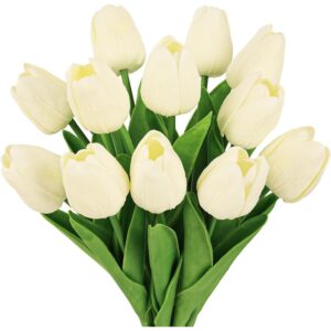 Twelve pale yellow real touch artificial tulips with green leaves
