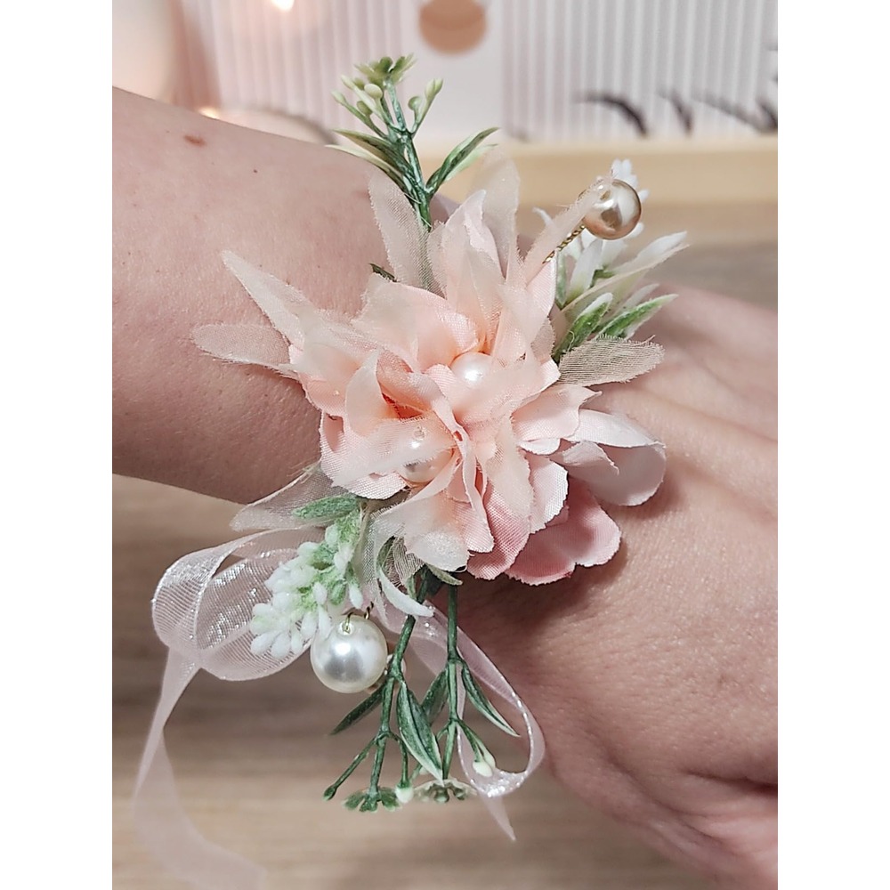 Customer photo: Blush pink bridal flower crown and wrist corsage with butterfly details