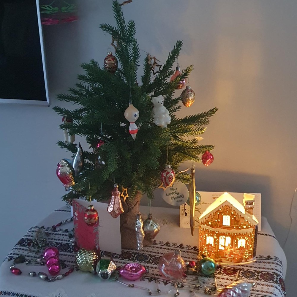 Customer display: Elecoutek natural green tabletop fir tree with a wrapped base (2ft)