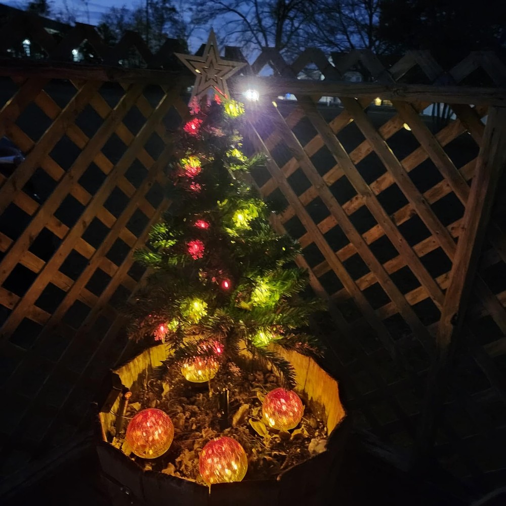 Customer display: Hugsvik solar outdoor Christmas trees with snowflake lights (pair, 110cm)