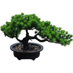 Low spreading artificial pine bonsai in an oval pot (19cm)