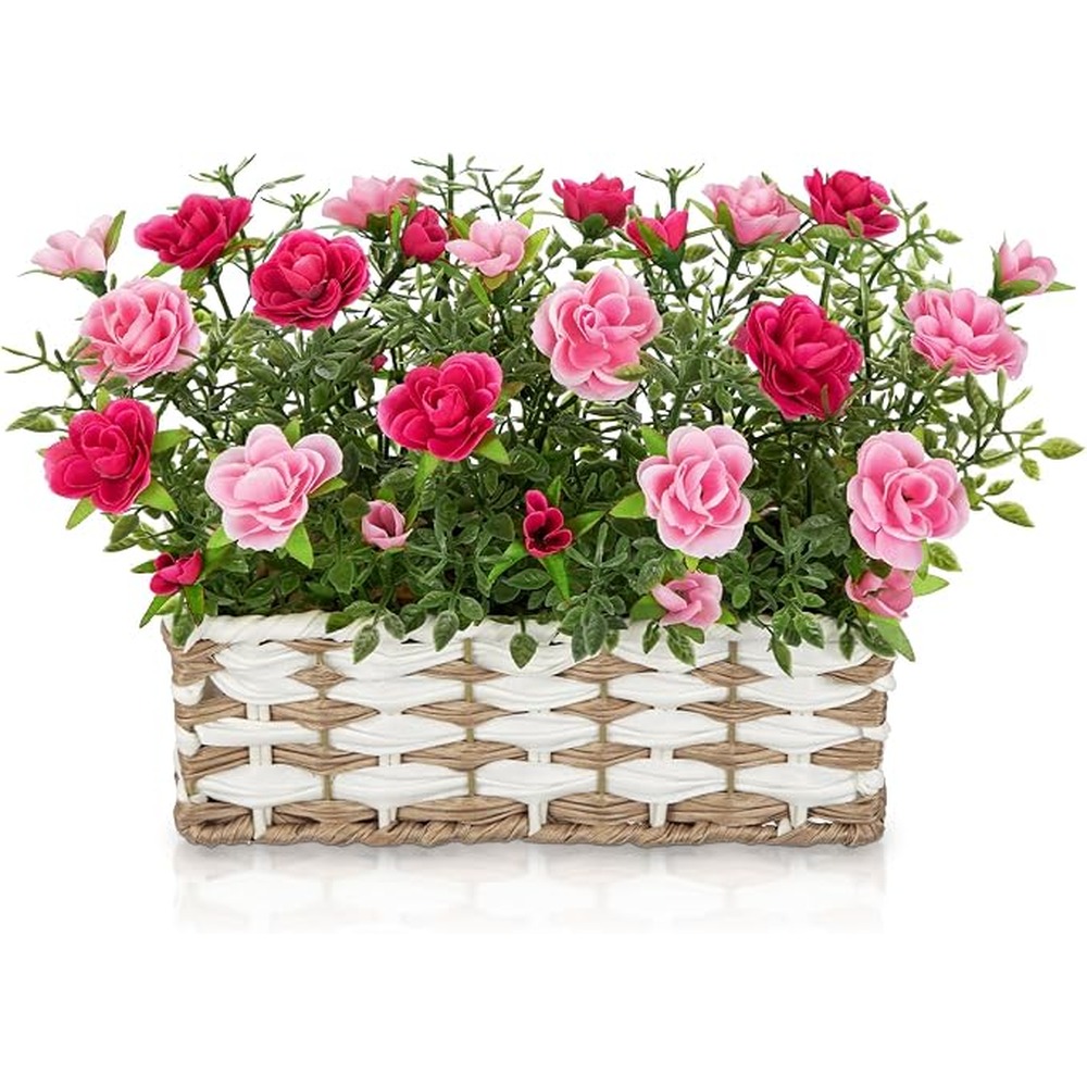 Pink artificial rose arrangement in a woven basket (22cm)
