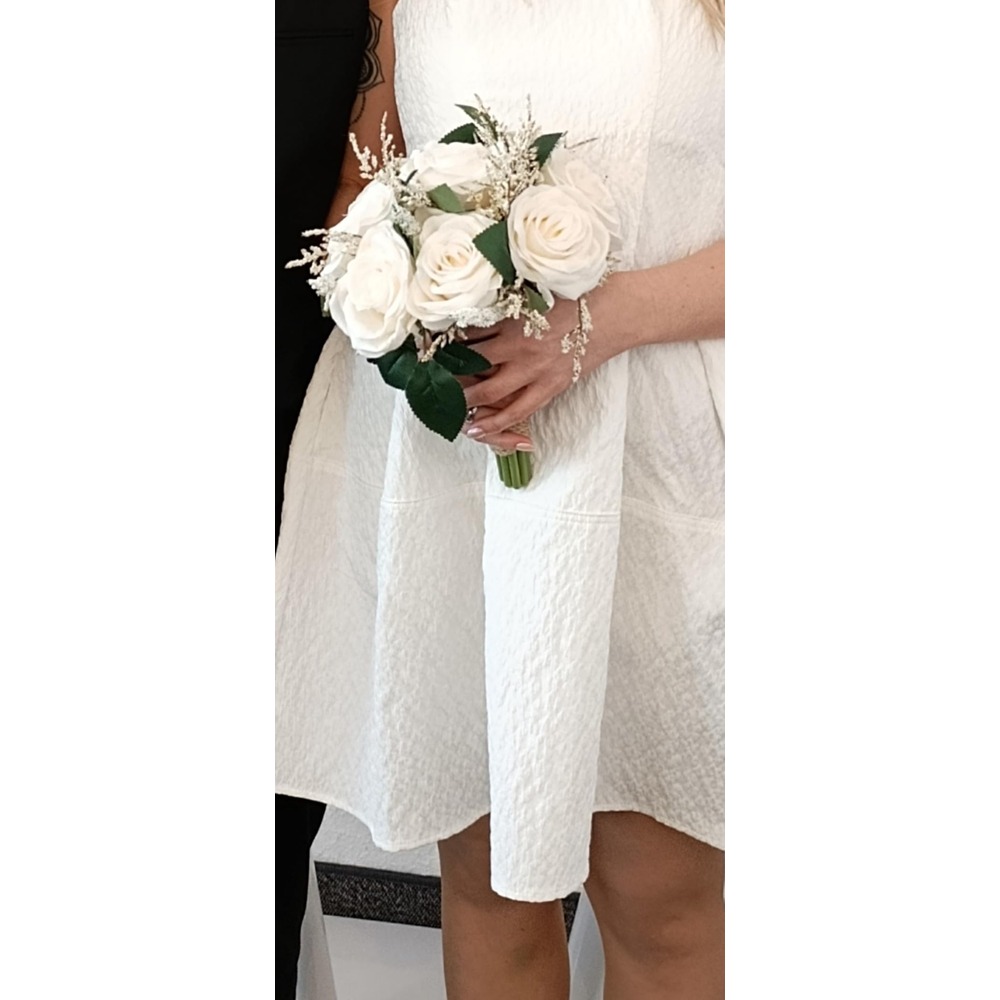 Customer photo: Small ivory artificial rose bridesmaid bouquet with a rustic handle