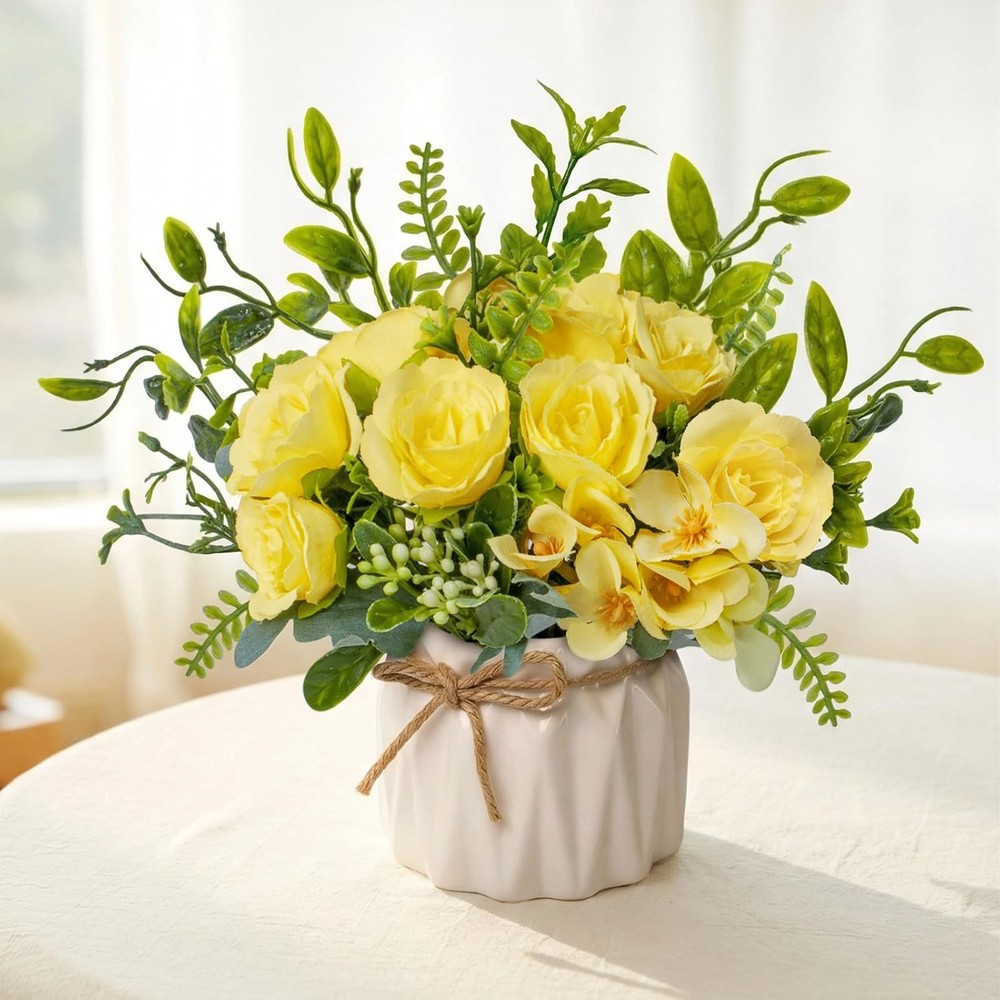 Small yellow artificial rose arrangement in a cream ceramic pot (16cm)