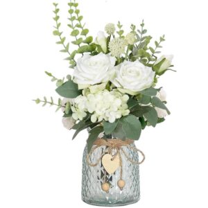 White artificial rose and hydrangea arrangement in a heart-detail glass vase (32cm)