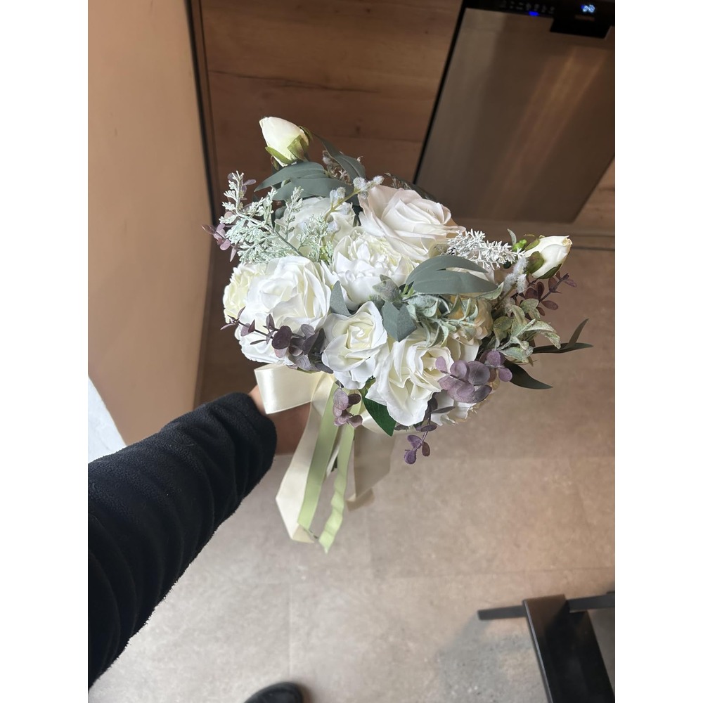 Customer photo: White artificial rose bridal bouquet with soft green foliage
