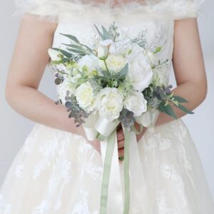 White artificial rose bridal bouquet with soft green foliage